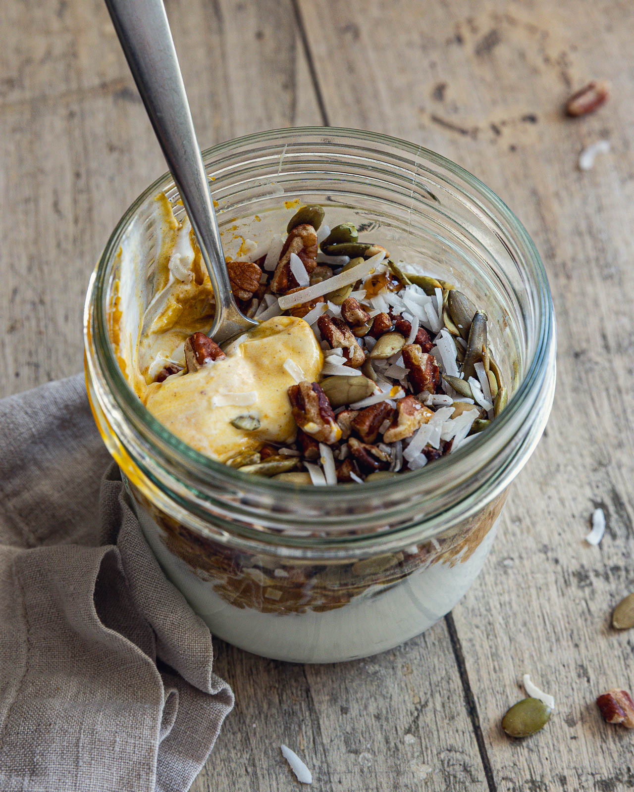 Pumpkin Greek Yogurt Bowl with pecans, pepitas and coconut flakes