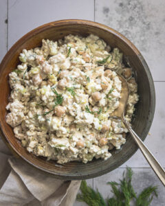 Chicken and chickpea salad with cottage cheese, celery and fresh dill